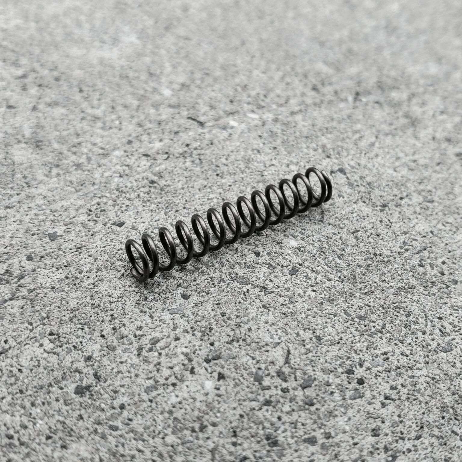Buffer retainer spring